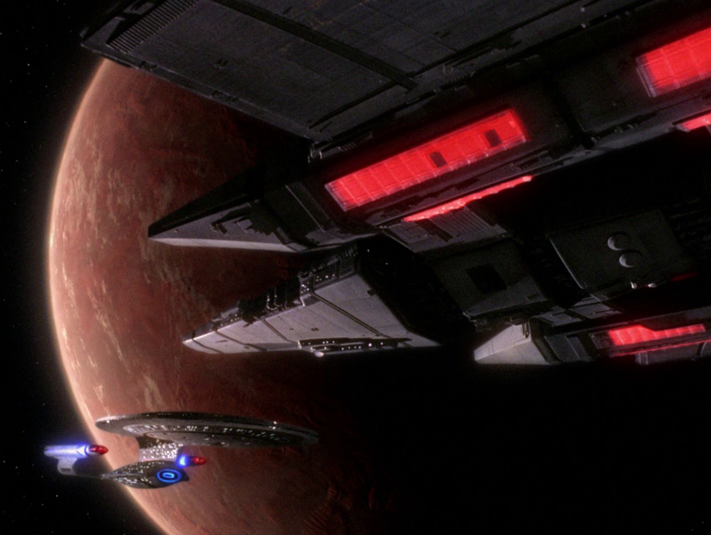 the Enterprise at left, the Tamarian ship at right